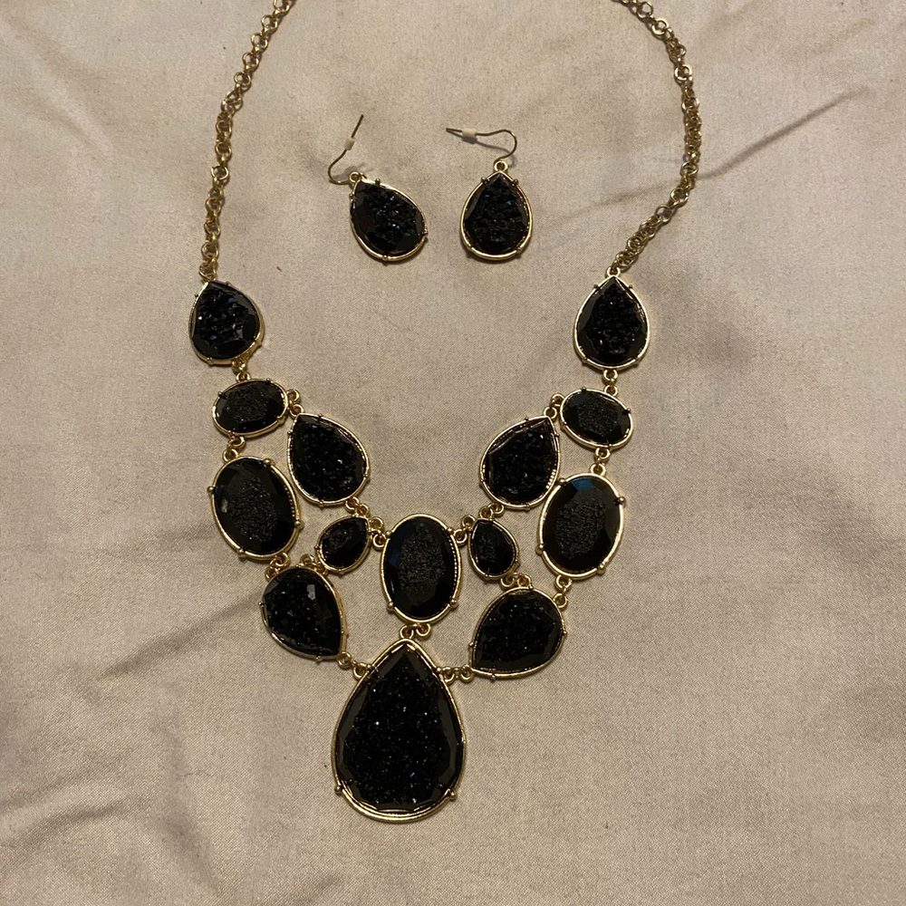 Sparkly black and gold evening wear pendant with matching earrings